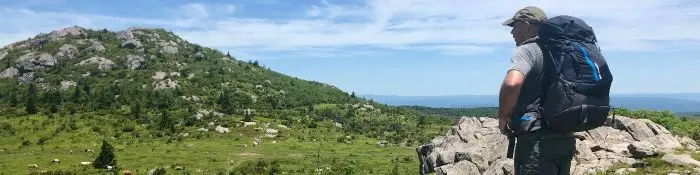John Ball on a mountain ridge